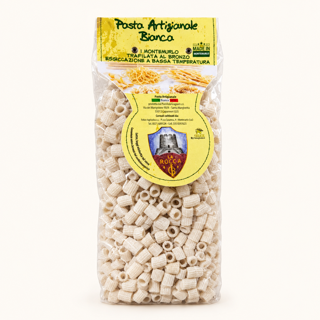 Confezione trasparente di pasta artigianale bianca corta, etichetta gialla con scritto Pasta Artigianale Bianca Montemurlo, con logo La Rocca.